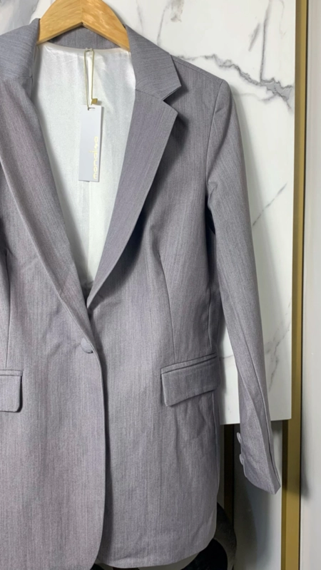 blazer alongado botão forrado