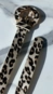 Cinto fino animal print fivela arco
