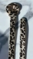 Cinto fino animal print fivela arco