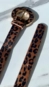 Cinto fino animal print fivela arco