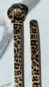 Cinto fino animal print fivela arco