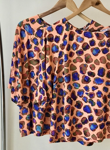blusa onca pessego