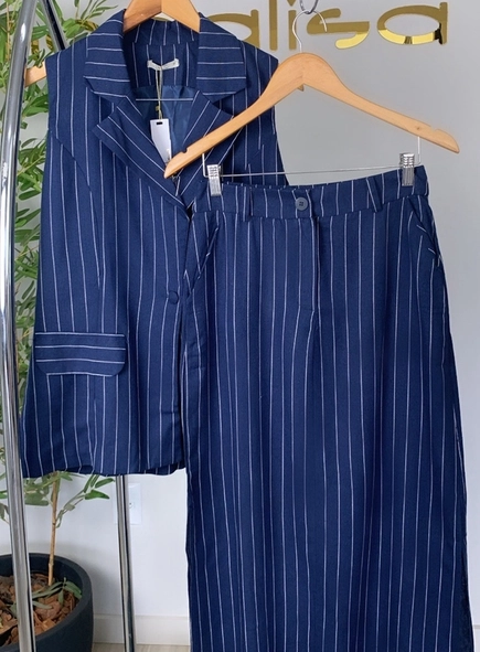 conjunto alfaiataria risca de giz saia e colete
